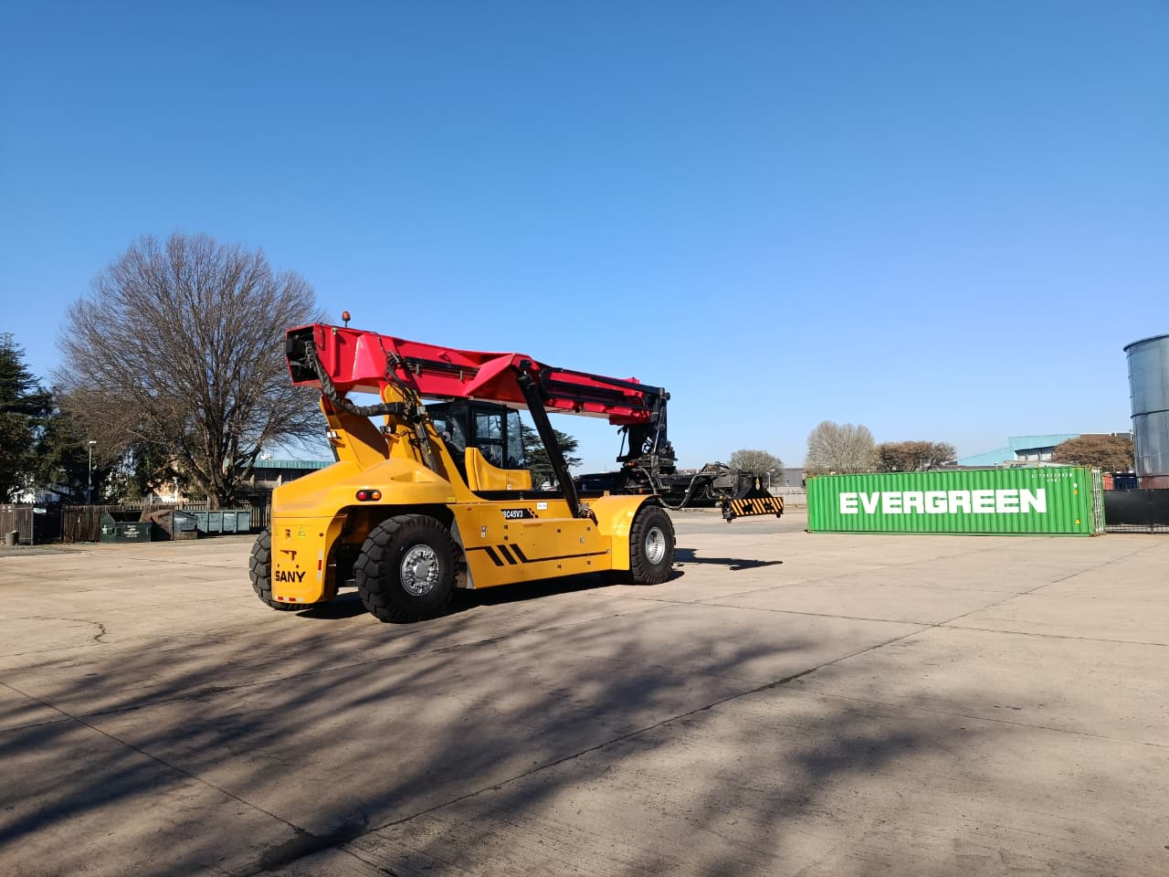 Container handling equipment supporting depot operations